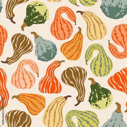 Seamless pattern of flat vector pumpkins. Colorful autumn vegetables. Harvest background