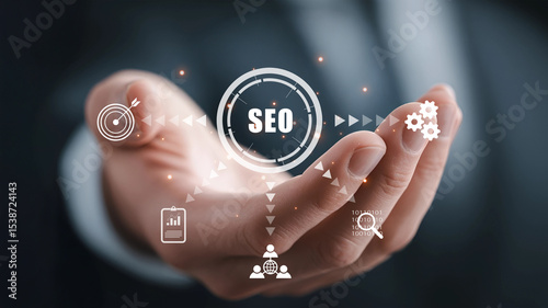 Hand holding SEO icons representing digital marketing and search optimization.