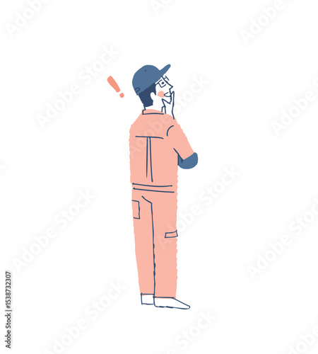 上の方を見て喜んでいる後ろ姿の作業服の男性