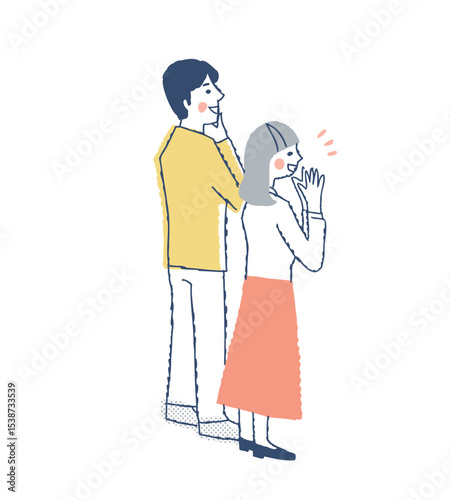 右の方を見て喜んでいる後ろ姿のカップル