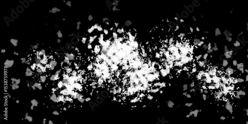 Snowflakes on dark background. white icy snowflakes isolated on black background, natural background. white crystalline powder on a black background. sugar dust. texture, pattern and clipping.
