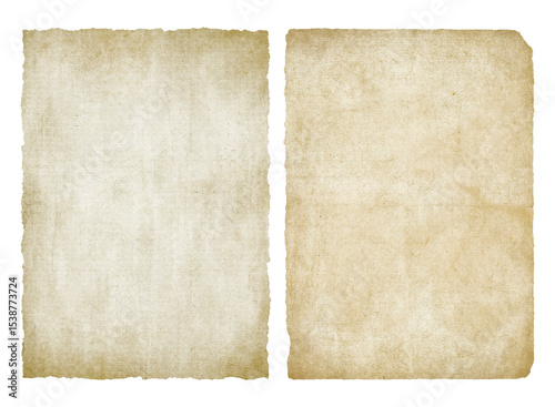 Vintage old paper with aged, textured surfaces and irregular torn edges. Antique historical worn parchment sheets background	
