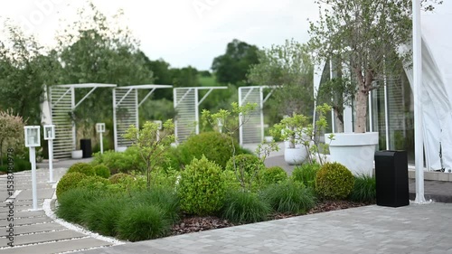 Wallpaper Mural A Tranquil Garden Landscape Showcasing Modern Design Elements and Lush Greenery. Torontodigital.ca