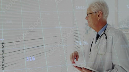 Doctor tapping tablet and swiping projected medical data on window while analyzing patient metrics