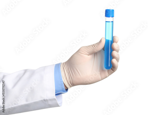 A gloved hand holding a test tube filled with blue liquid against a black background.