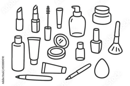 Beauty products and makeup tools laid out on a flat surface for a creative arrangement and inspiration