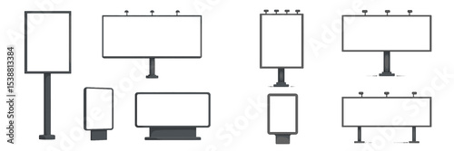 Multiple blank billboards in various sizes and orientations located in an urban setting during daylight hours