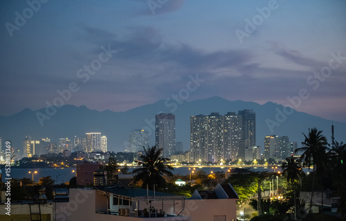 Nha Trang at night, Khanh Hoa province, Vietnam. View of Nha Trang city modern skyline during sunset