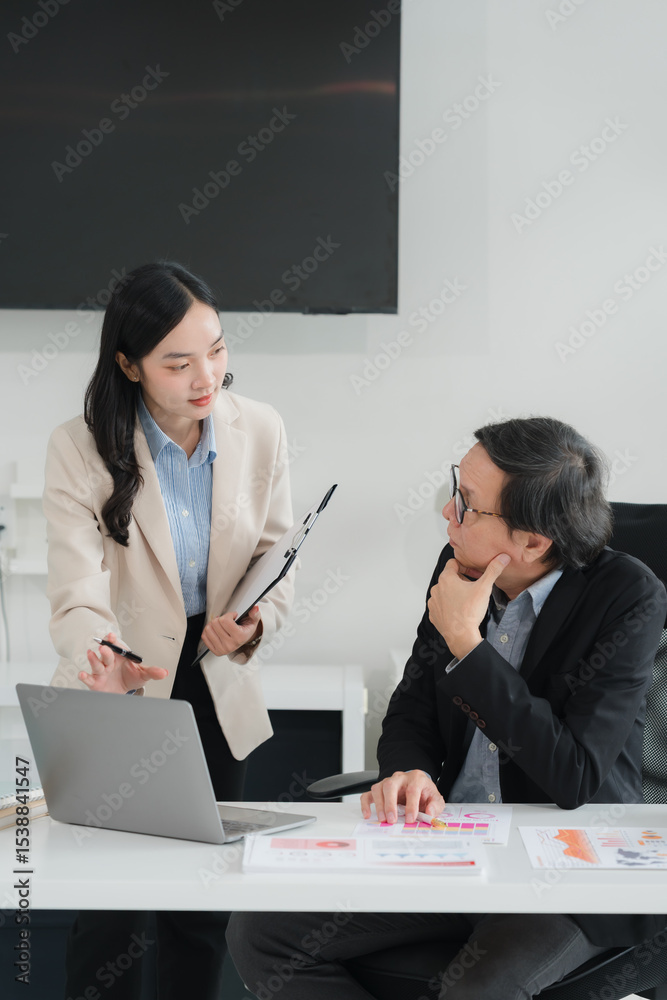 Fototapeta premium Business Professionals Collaborating in Office