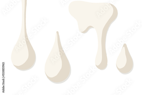 Various drops of creamy liquid arranged on a white background in a simple yet elegant display
