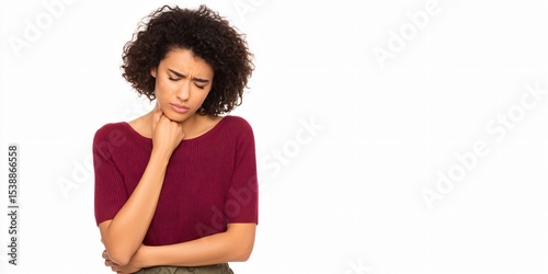 Woman experiencing nausea and discomfort while clutching stomach in a calm indoor environment