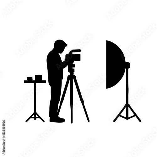 Food photographer adjusting camera during a photo shoot setup  