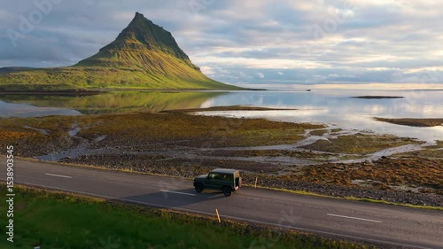 Car Through Iceland Landscape mountains Epic Scenic Road Trip Scene. Kirkjufell