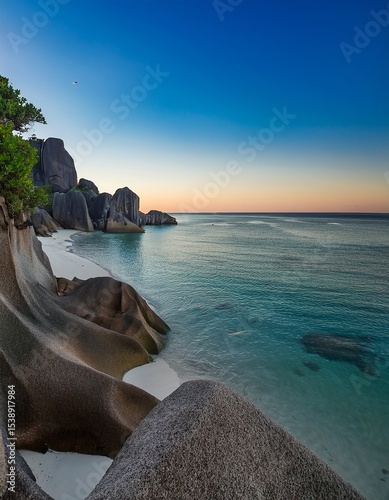 Stunning Sunrise Over Anse Source d'Argent Beach in the Seychelles, Featuring Granite Rocks and Turquoise Waters | Idyllic Tropical Scenery