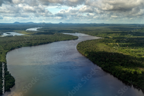 Aerial view of the jungle and Amazon River with its lush vegetation and the intensity of the tropical colors. An amazing landscape