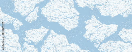 Frozen landscape reveals ice floes drifting across a serene river under the soft winter sun in a tranquil, remote environment