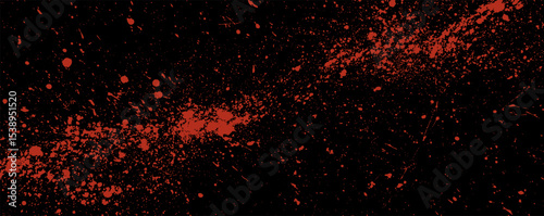 Vibrant splatters of red paint against a deep black backdrop create an energetic and dynamic abstract composition