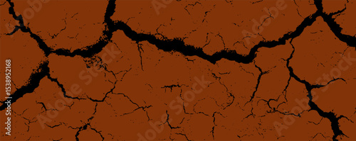 Cracked earth showcases dry conditions and environmental changes in rural landscapes