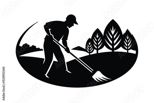 Person Raking Leaves in Landscape