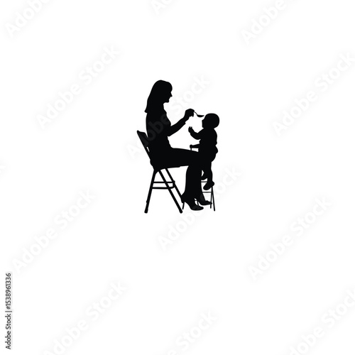 woman feeding baby with spoon silhouette on white background
