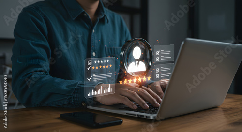 Person using laptop, digital interface shows magnifying glass over profile, five stars, checkmarks, and graphs, illustrating online reputation management and review monitoring.