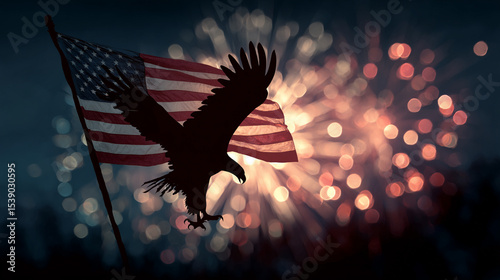 A stylized silhouette of an eagle carrying a fluttering U.S. flag across a dark twilight sky with fireworks in the distance. stock image