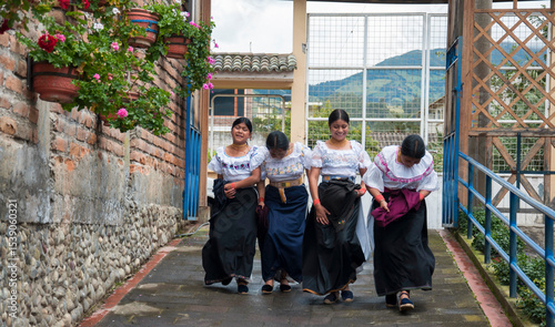 Indigenous ecuadorian women dancing traditional dance in otavalo