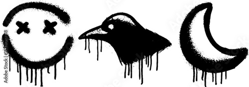 Urban graffiti art featuring raven, moon, and smoke trail designs
