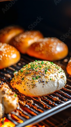 Grilling burger buns, herb butter, outdoor, flames
