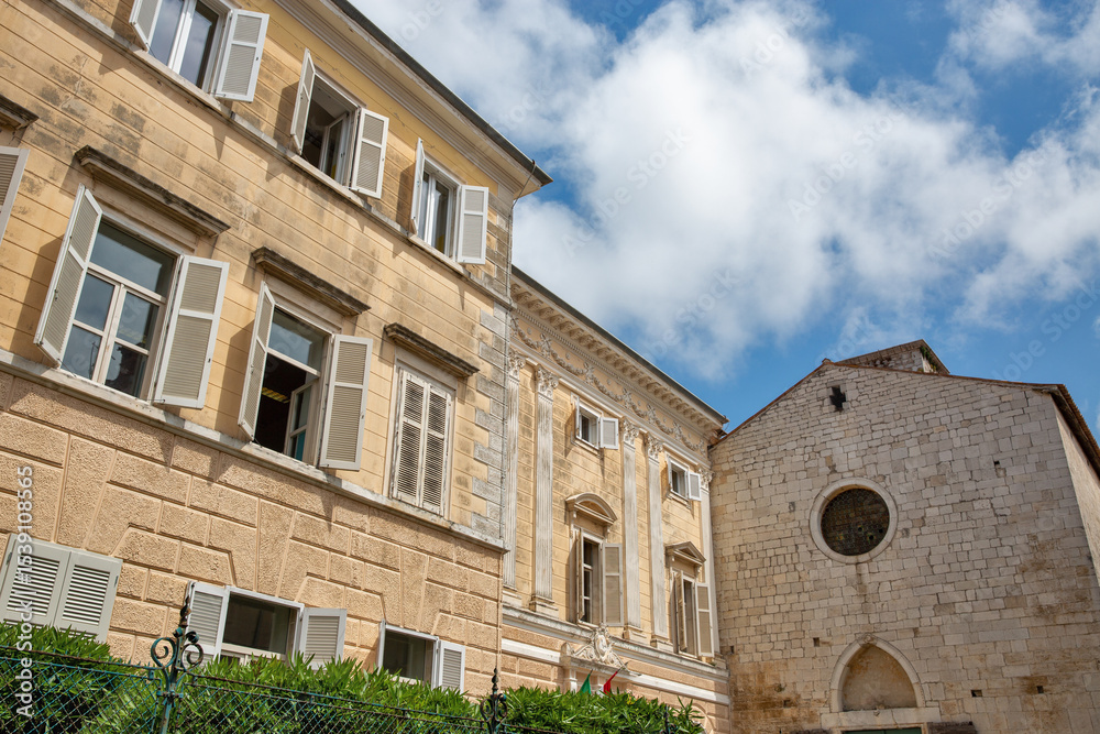 Fototapeta premium Historic european building and old stone church. Porec, Croatia.