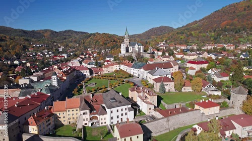 Flight over of old town Kremnica at autumn, Central Slovakia.