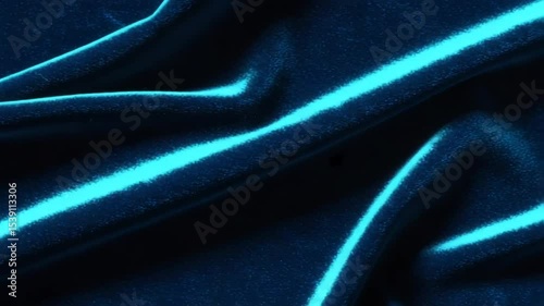 Shimmering blue fabric with glowing lines in folds