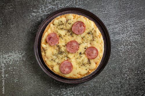 Small personal pizza. Calabrian sausage pizza.