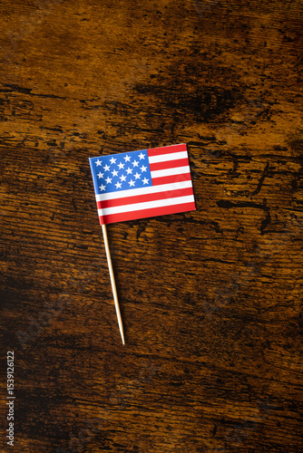 American flag over wooden background