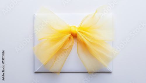 Elegant Yellow Bow on White Envelope