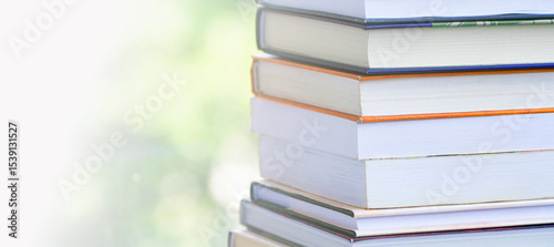 A simple composition of many hardback books. Going back to school. Education.