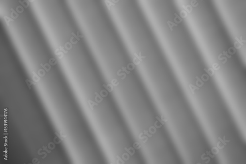 Abstract pattern of diagonal lines in soft gradient lighting