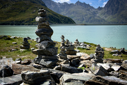 Obraz na plátně Rocks arranged in a Zen style on a rock usually signify a form of meditation and striving for inner balance
