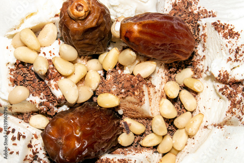 Ice cream with chocolate and nuts.Ice cream with pine nuts.Ice cream with chocolate chips.