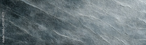 Blue-gray soapstone with fine grain and soft linear texture in flat close view