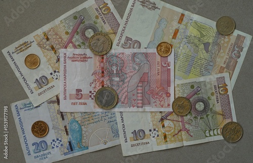 Bulgarian leva banknotes and coins arranged on neutral background. Bulgarian Levs. Bulgarian National Currency. Bulgarian National Bank