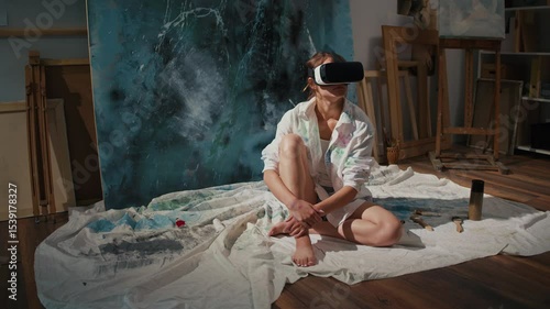 An Artist Uses VR to Immerse Himself in a Virtual Studio, Creating and Exploring New Artistic Worlds. Combines Traditional Art Techniques with Modern Digital Tools in an Innovative Virtual Environment
