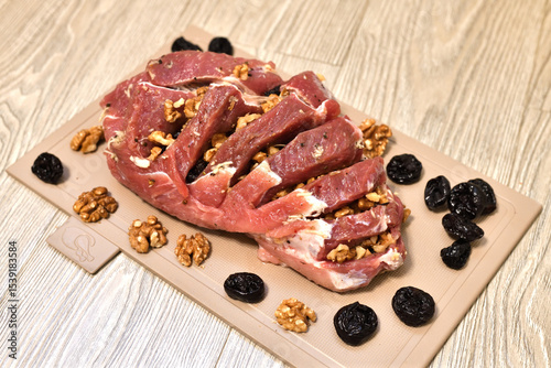Raw Pork stuffed with walnuts and prunes