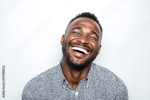 Smiling individual in patte...