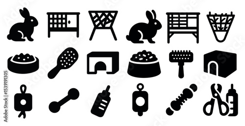 Collection of pet supplies including a rabbit cage, a litter box, and a pet brush. Concept of organization and care for pets