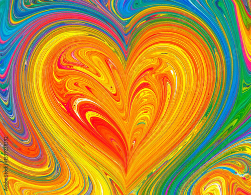 A swirling pattern of vibrant, colorful paint creates an abstract, fluid heart shape on a canvas.