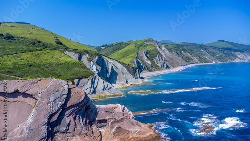 Tableau sur toile Flysch cliffs rising from the turquoise sea of zumaia, basque country, spain