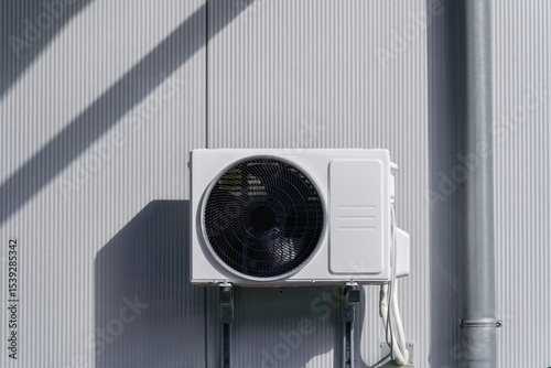 Split air conditioning unit, cooling and supplement to existing heating system