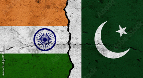 India-Pakistan Tension: A cracked concrete wall depicts the flags of India and Pakistan, symbolizing geopolitical conflict and strained relations between the two nations.