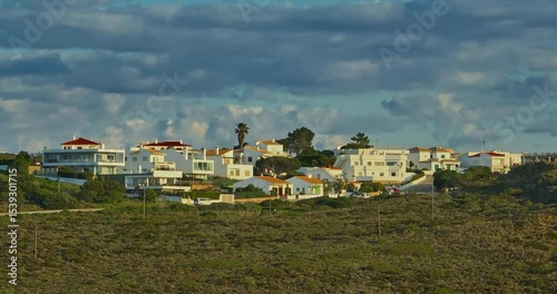 Aerial view of Aljezur Portugal. A small, cozy, traditional surf town at sunset